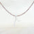 White Coral Branch on a Faceted Peach Sapphire Bead Strand