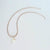 White Coral Branch on a Faceted Peach Sapphire Bead Strand