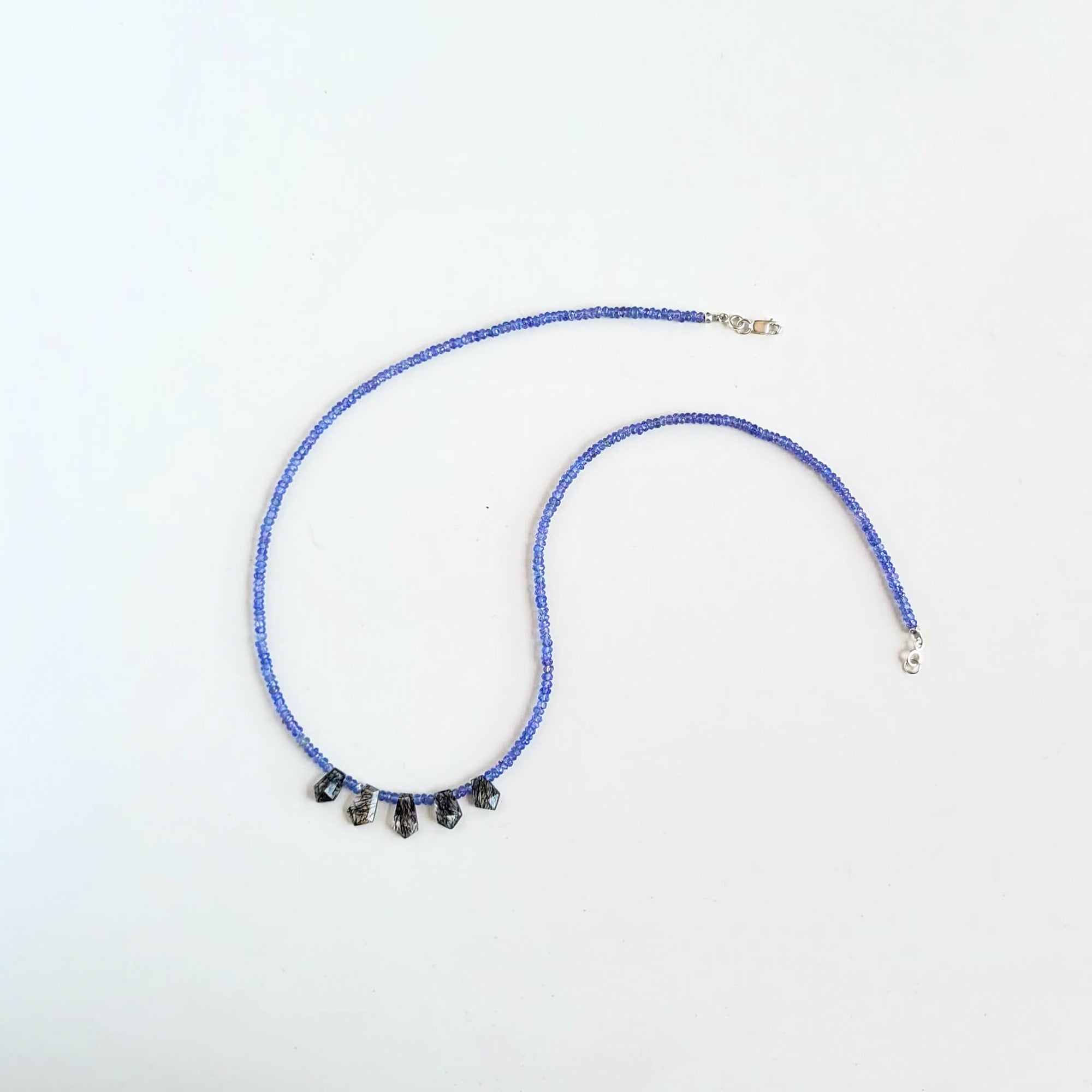 Tanzanite Faceted Bead Strand with Tourmalated Quartz Daggers