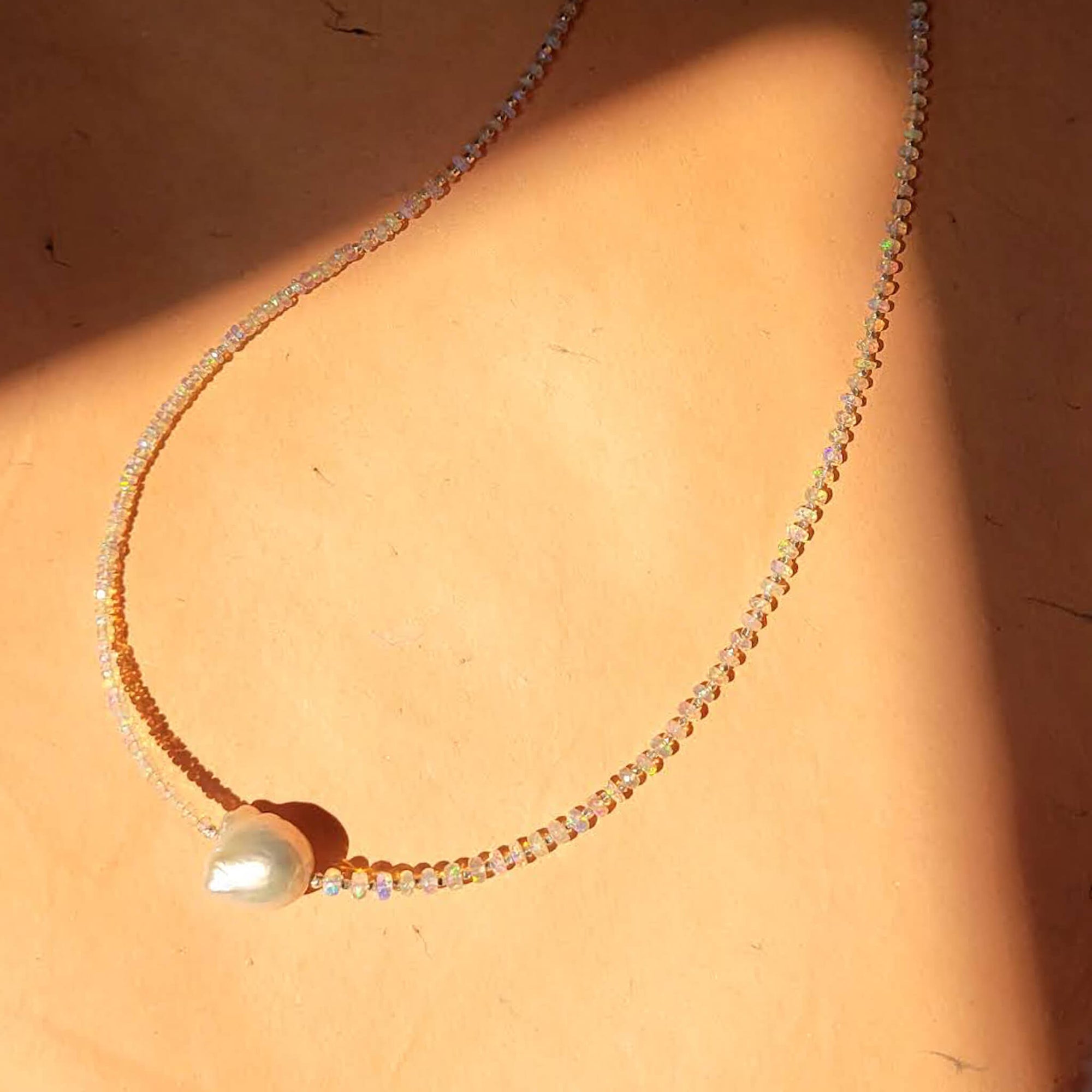 Iridescent Opal and Silver Necklace with a Baroque Pearl Center