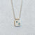 Sterling silver pendant necklace with blue diamond accents. Handmade by EC Design Jewelry in Minneapolis, MN.