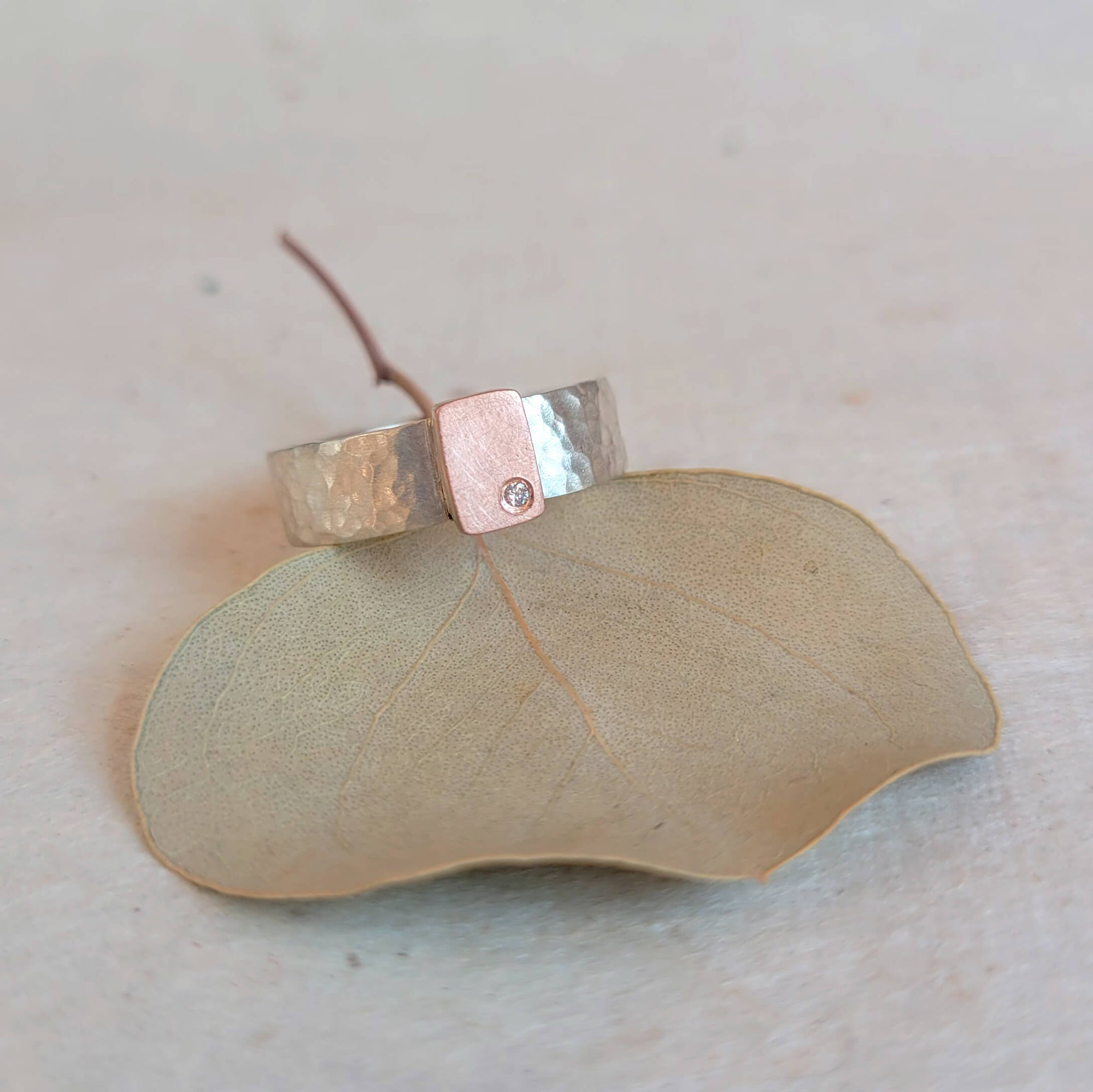 Raised Rose Gold Cell on a Hammered Sterling Silver Band