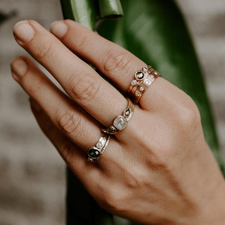 Three stone red gold ring with rose cut and brilliant cut champagne diamonds. Handmade by EC Design in Minneapolis, MN using recycled metal and conflict-free stones.