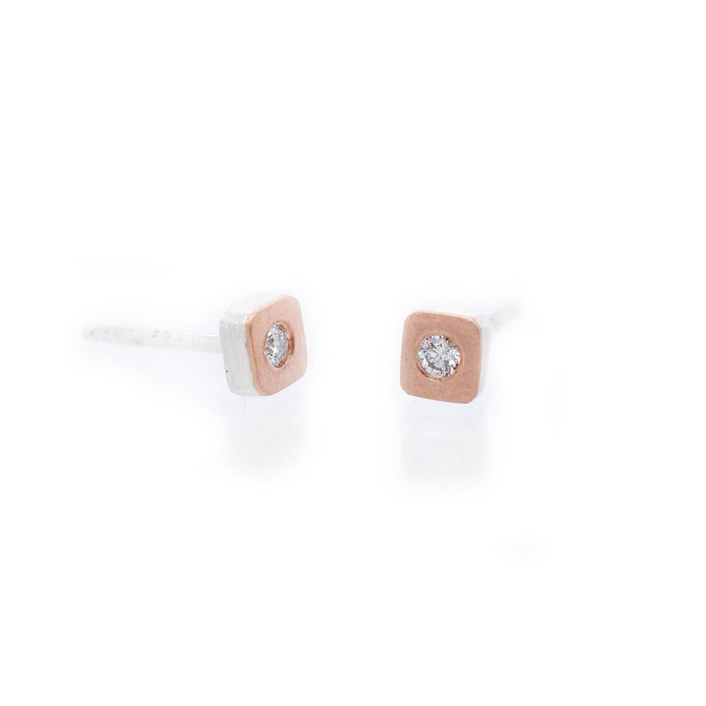 Red gold and sterling silver square studs with diamond accents. Handmade by EC Design Studio in Minneapolis, MN using recycled metal and conflict-free stones.