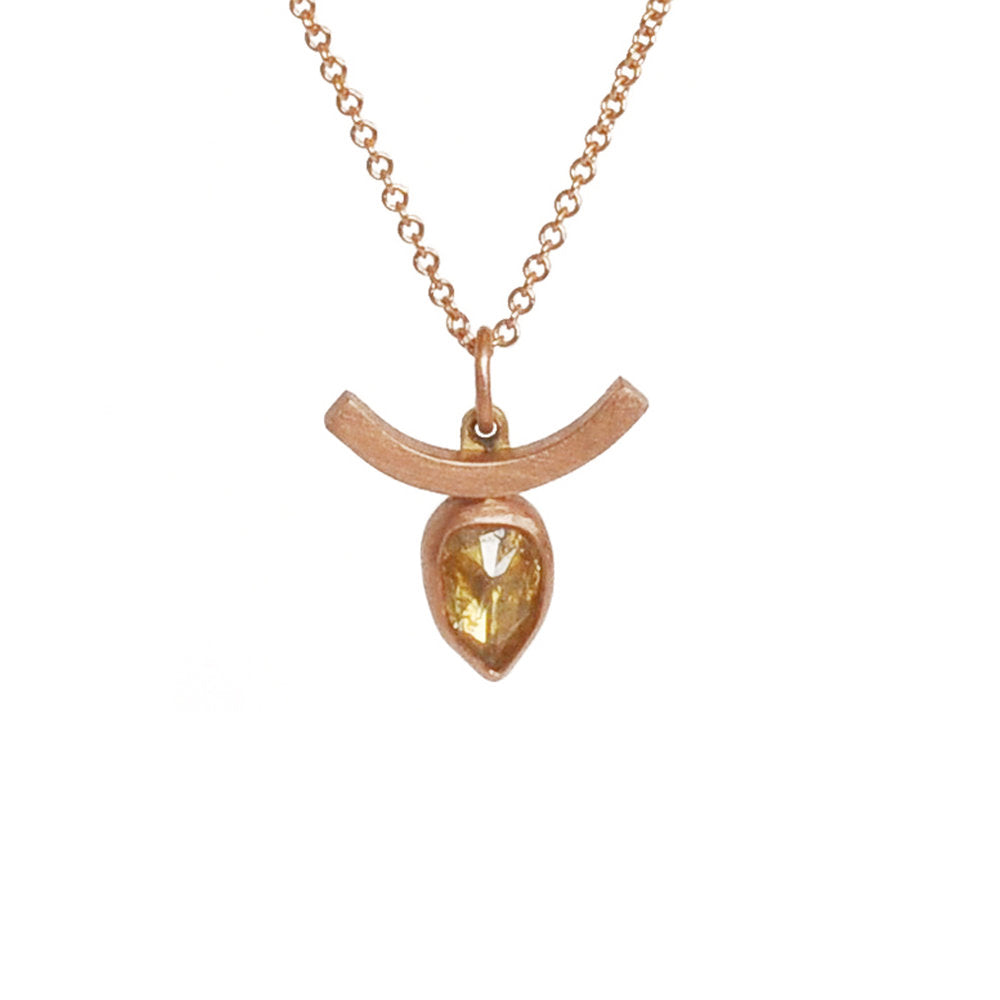 Rose gold and yellow diamond Taurus pendant from EC Design Jewelry in Minneapolis, MN. Handmade with recycled metal and conflict-free stone.