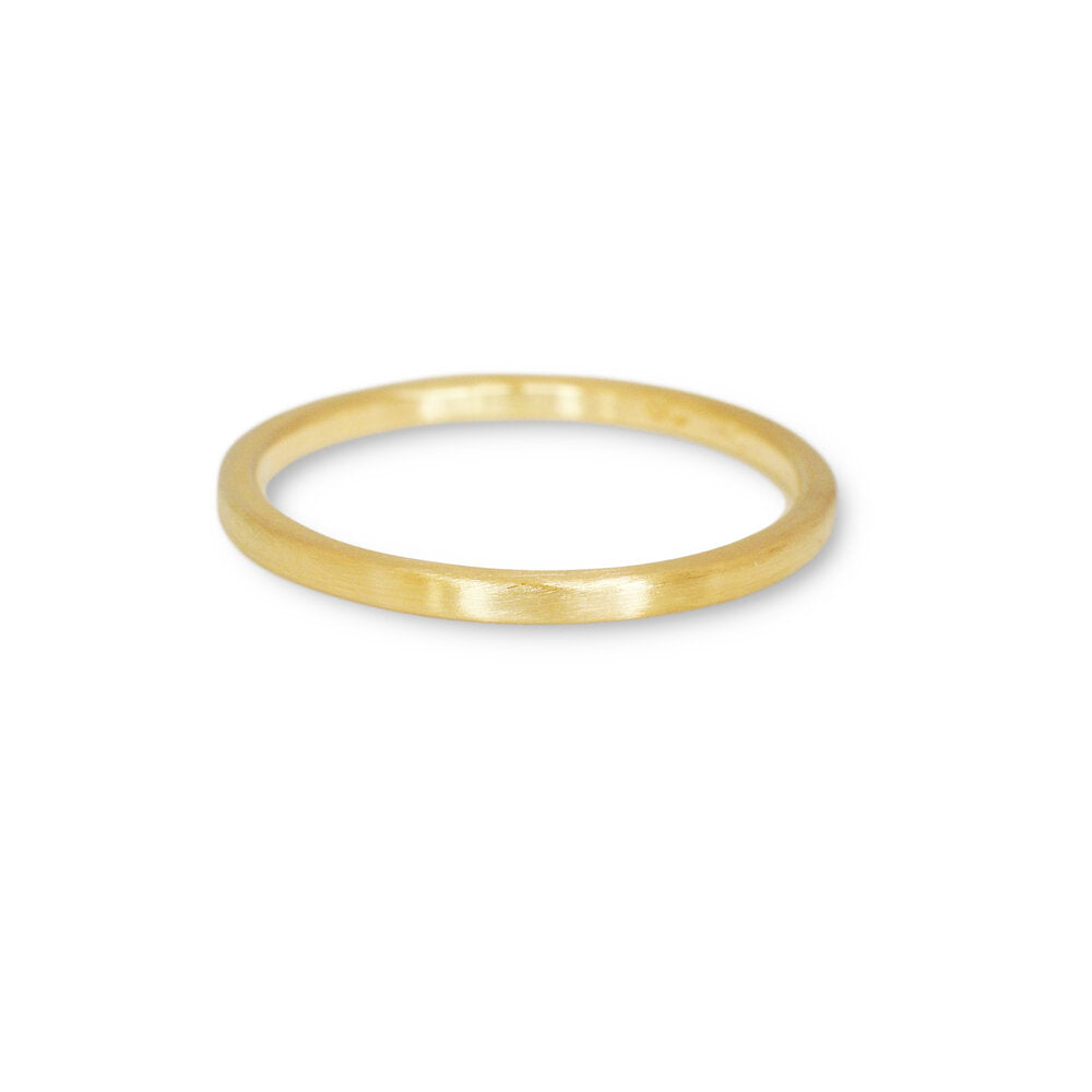 Handmade yellow gold wedding band. Made in Minneapolis, MN by EC Design Studio.